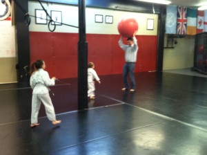 Dad plays before kid's martial arts class